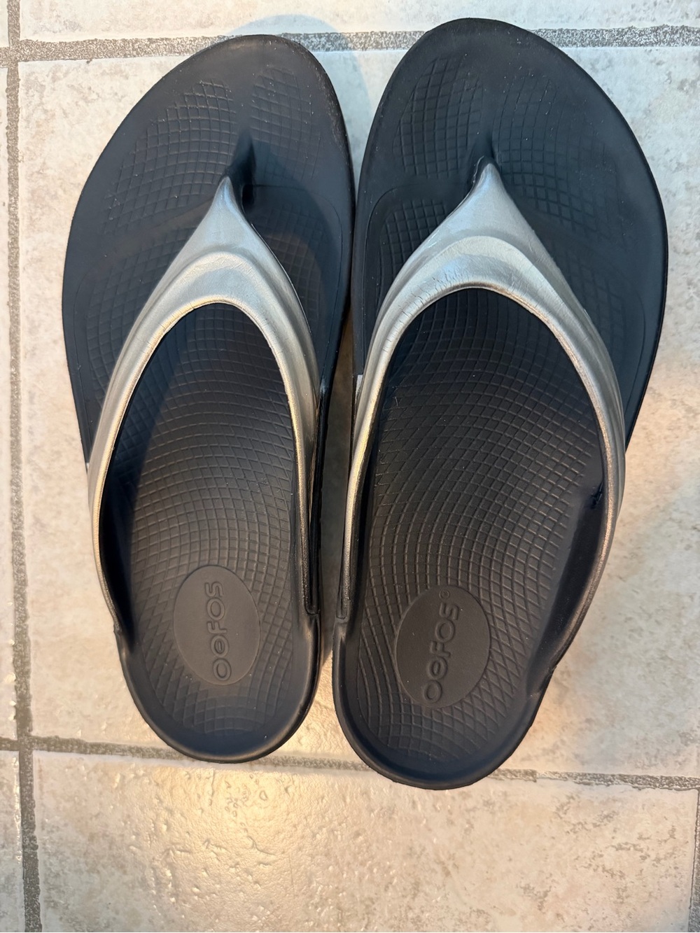OOFOS Oolala Luxe Black Flip-Flops with Silver Straps